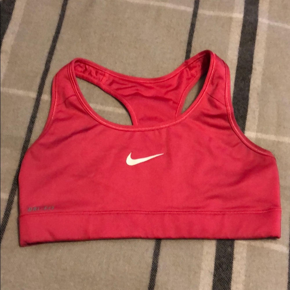 Hot pink Nike sports bra